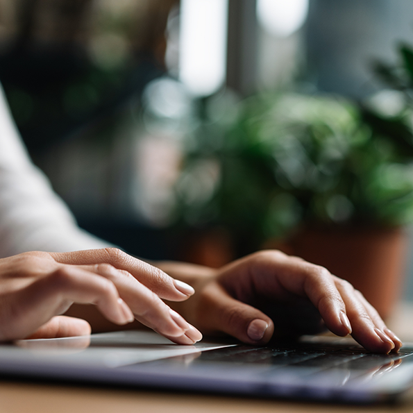 Person typing on a laptop